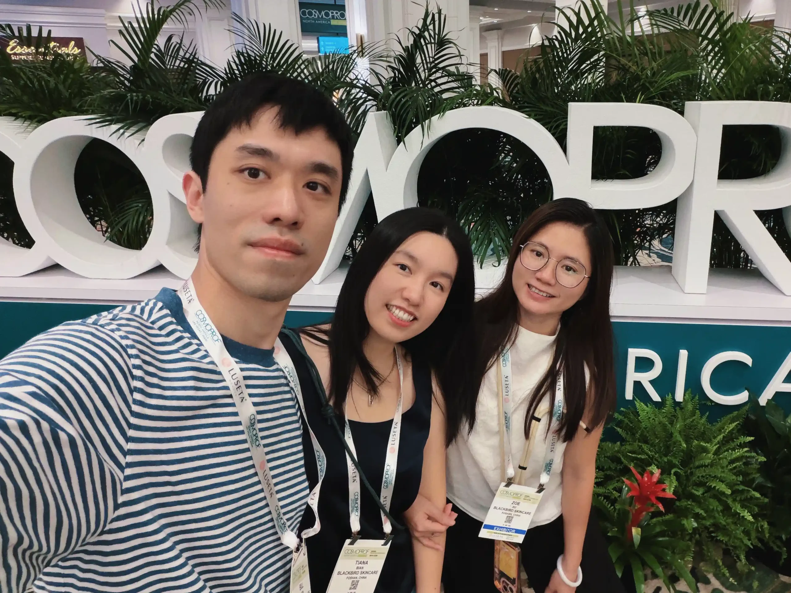 Three Blackbird team members at Cosmoprof.