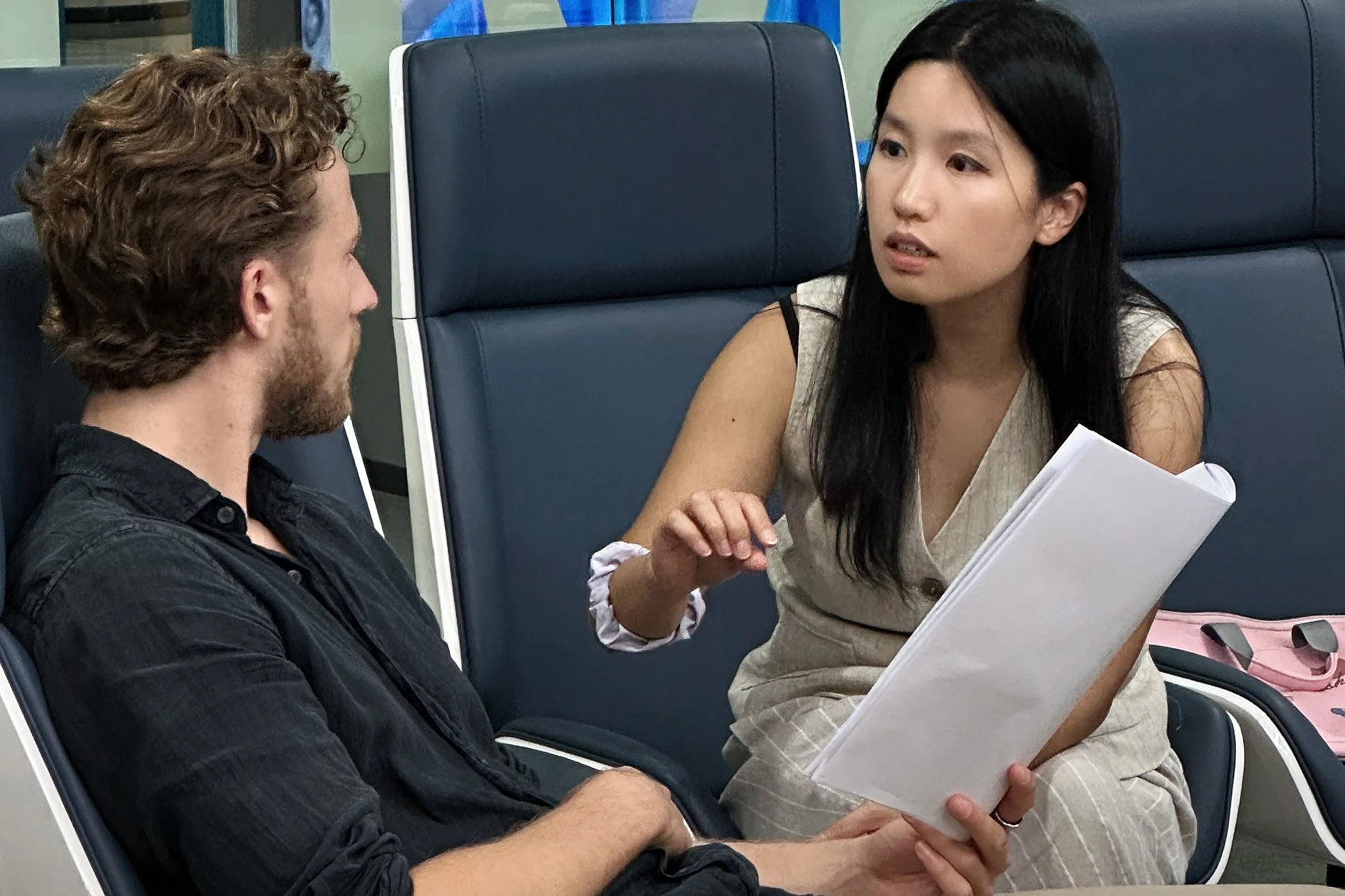 A Blackbird team member discussing a brief with a client.
